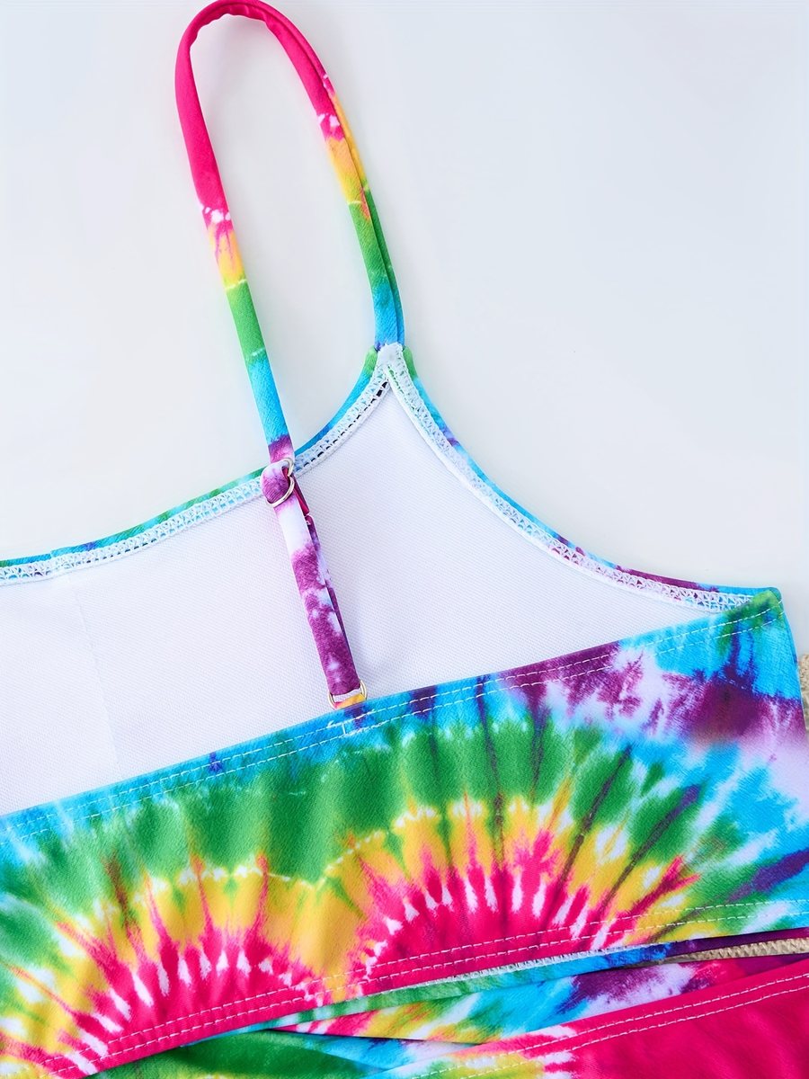 Close-up of the covered elastic binding and stitching on the girls' tie-dye bikini top