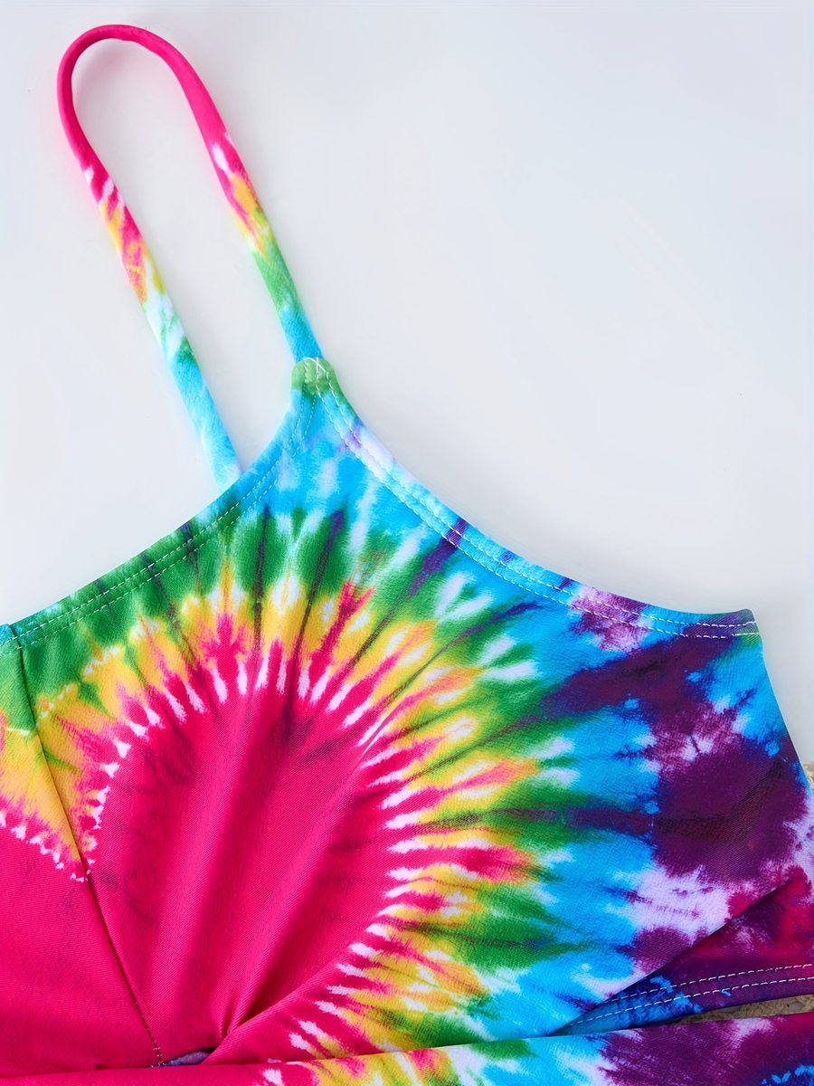 Close-up of the adjustable strap and metal ring slider on the girls' tie-dye bikini top